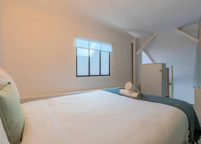 One Bedroom Mezzanine Apartment, With Parking