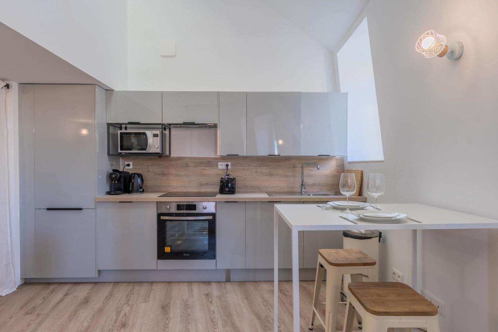 One Bedroom Mezzanine Apartment, With Parking